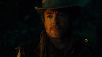 Movie still from “Jumanji: Welcome to the Jungle” (2017), directed by Jake Kasdan – A person wearing a hat; Close Up shot, Low angle
