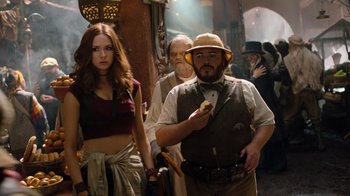 Movie still from “Jumanji: Welcome to the Jungle” (2017), directed by Jake Kasdan – A group of people standing next to each other in a room; Medium shot, Over the shoulder angle