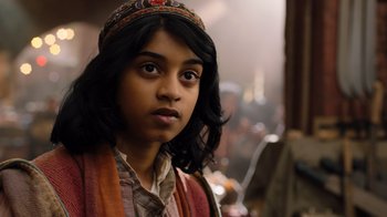 Movie still from “Jumanji: Welcome to the Jungle” (2017), directed by Jake Kasdan – A young girl with long black hair wearing a hat; Close Up shot, Over the shoulder angle