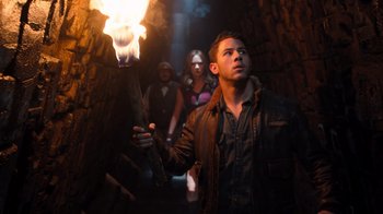 Movie still from “Jumanji: Welcome to the Jungle” (2017), directed by Jake Kasdan – A group of people standing next to each other; Medium shot, Low angle