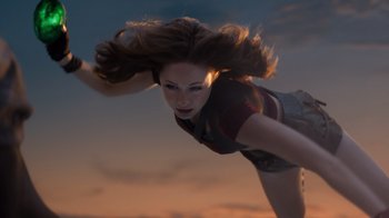 Movie still from “Jumanji: Welcome to the Jungle” (2017), directed by Jake Kasdan – A woman flying through the air while holding onto a rope; Medium shot, Low angle