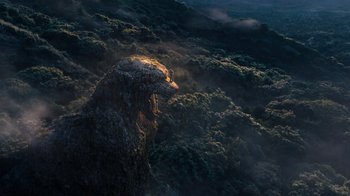 Movie still from “Jumanji: Welcome to the Jungle” (2017), directed by Jake Kasdan – An aerial view of a mountain with trees in the background; Extreme Wide shot, Low angle