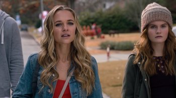 Movie still from “Jumanji: Welcome to the Jungle” (2017), directed by Jake Kasdan – A beautiful young woman with long blonde hair; Close Up shot, Over the shoulder angle