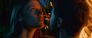 Movie still from “Jungle” (2017), directed by Greg McLean – A man and a woman looking into each other's eyes; Close Up shot, Low angle