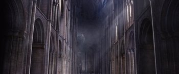 Movie still from “Jupiter Ascending” (2015), directed by Lilly Wachowski – A large cathedral with smoke coming out of the ceiling; Extreme Wide shot, High angle