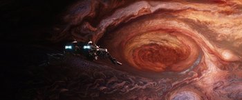 Movie still from “Jupiter Ascending” (2015), directed by Lilly Wachowski – An image of a space ship in the sky; Extreme Wide shot, Overhead angle