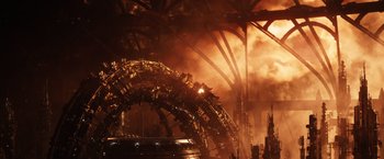 Movie still from “Jupiter Ascending” (2015), directed by Lilly Wachowski – A ferris wheel in the middle of an amusement park; Extreme Wide shot, High angle