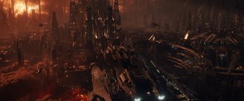 Movie still from “Jupiter Ascending” (2015), directed by Lilly Wachowski – An image of an alien ship in the middle of a city; Extreme Wide shot, Overhead angle