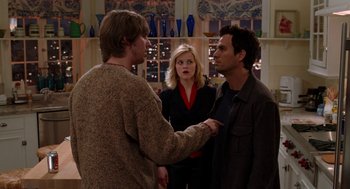 Movie still from “Just Like Heaven” (2005), directed by Mark Waters – A man and a woman standing in front of a woman; Medium shot, Over the shoulder angle