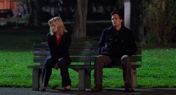 Movie still from “Just Like Heaven” (2005), directed by Mark Waters – A man and a woman sitting on a park bench; Wide shot, High angle