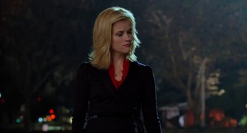 Movie still from “Just Like Heaven” (2005), directed by Mark Waters – A woman with blonde hair wearing a black dress; Medium shot, Over the shoulder angle
