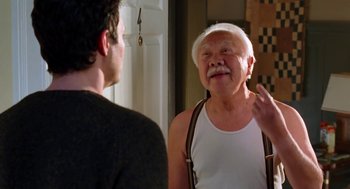 Movie still from “Just Like Heaven” (2005), directed by Mark Waters – An older man wearing a white hat talking to a younger man; Medium shot, Over the shoulder angle