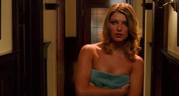 Movie still from “Just Like Heaven” (2005), directed by Mark Waters – A beautiful woman wrapped in a towel in a bathroom; Close Up shot, Over the shoulder angle