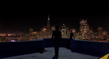 Movie still from “Just Like Heaven” (2005), directed by Mark Waters – A man and a woman standing on a balcony at night; Extreme Wide shot, Low angle