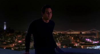 Movie still from “Just Like Heaven” (2005), directed by Mark Waters – A man standing on top of a building at night; Medium shot, Over the shoulder angle