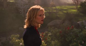 Movie still from “Just Like Heaven” (2005), directed by Mark Waters – A beautiful blonde woman standing in a garden; Close Up shot, Over the shoulder angle
