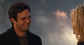 Movie still from “Just Like Heaven” (2005), directed by Mark Waters – A person wearing a jacket and smiling; Close Up shot, Over the shoulder angle