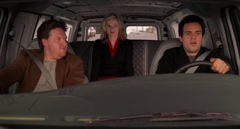 Movie still from “Just Like Heaven” (2005), directed by Mark Waters – A group of people sitting in the back of a van; Medium shot, High angle