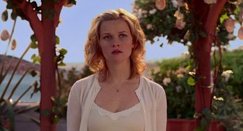 Movie still from “Just Like Heaven” (2005), directed by Mark Waters – A woman with blonde hair wearing a white top; Close Up shot, Low angle