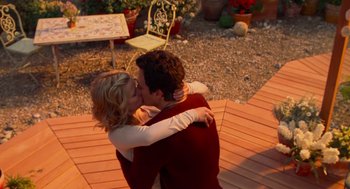 Movie still from “Just Like Heaven” (2005), directed by Mark Waters – A man and a woman kissing on a patio; Medium shot, High angle