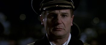 Movie still from “K-19: The Widowmaker” (2002), directed by Kathryn Bigelow – A person wearing a hat; Close Up shot, Low angle