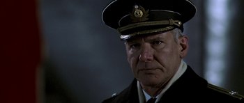 Movie still from “K-19: The Widowmaker” (2002), directed by Kathryn Bigelow – A person wearing a uniform; Close Up shot, Low angle