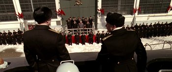 Movie still from “K-19: The Widowmaker” (2002), directed by Kathryn Bigelow – A group of men standing on top of a boat; Extreme Wide shot, High angle