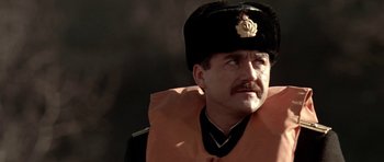 Movie still from “K-19: The Widowmaker” (2002), directed by Kathryn Bigelow – A person wearing a uniform; Close Up shot, Low angle