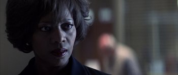 Movie still from “K-PAX” (2001), created by Robert Cochran – A person with short hair; Close Up shot, Low angle