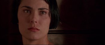 Movie still from “Kalifornia” (1993), directed by Dominic Sena – A person with short hair; Close Up shot, Low angle