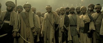 A large group of men standing next to each other