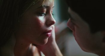 Movie still from “Kids” (1995), directed by Larry Clark – A young woman's face and a young man's face; Extreme Close Up shot, Over the shoulder angle