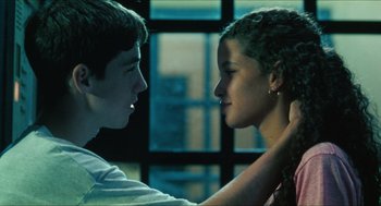 Movie still from “Kids” (1995), directed by Larry Clark – A young man and a young woman face to face; Close Up shot, Low angle