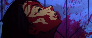 Movie still from “Kill Bill: Vol. 1” (2003), directed by Quentin Tarantino – A drawing of a woman's face with red and white paint on it; Extreme Close Up shot, Overhead angle