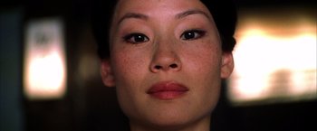 Movie still from “Kill Bill: Vol. 1” (2003), directed by Quentin Tarantino – A woman's face with red lipstick; Extreme Close Up shot, Low angle