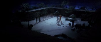 Movie still from “Kill Bill: Vol. 1” (2003), directed by Quentin Tarantino – Two people are playing baseball in the snow at night; Extreme Wide shot, High angle