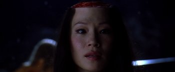 Movie still from “Kill Bill: Vol. 1” (2003), directed by Quentin Tarantino – A person wearing a headband; Close Up shot, High angle