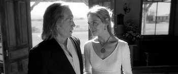 Movie still from “Kill Bill: Vol. 2” (2004), directed by Quentin Tarantino – A man and a woman standing next to each other; Close Up shot, Low angle