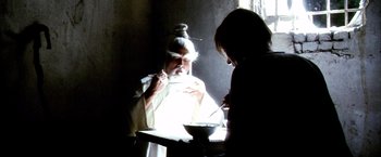 Movie still from “Kill Bill: Vol. 2” (2004), directed by Quentin Tarantino – Medium shot, Over the shoulder angle