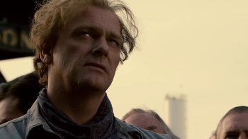 Movie still from “Kill the Irishman” (2011), directed by Jonathan Hensleigh – A person looking at the camera; Close Up shot, Low angle