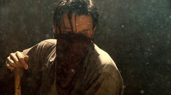 Movie still from “Kill the Irishman” (2011), directed by Jonathan Hensleigh – A man with his face covered in rain; Close Up shot, Low angle