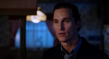 Movie still from “Killer Joe” (2011), directed by William Friedkin – Matthew mcconaughey wearing a suit; Close Up shot, Over the shoulder angle