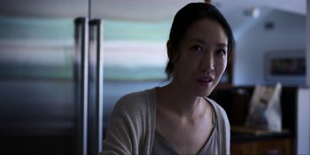 Movie still from “Kimi” (2022), directed by Steven Soderbergh – A person wearing a sweater; Close Up shot, Over the shoulder angle