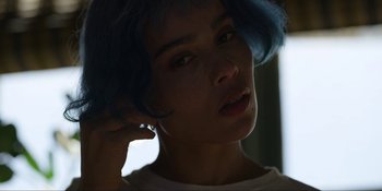 Movie still from “Kimi” (2022), directed by Steven Soderbergh – A person with blue hair; Close Up shot, High angle