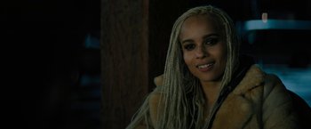 Movie still from “Kin” (2018), directed by Josh Baker – A person with dreadlocks; Close Up shot, Over the shoulder angle