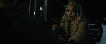 Movie still from “Kin” (2018), directed by Josh Baker – A woman with dreadlocks sitting in front of a mirror; Close Up shot, High angle