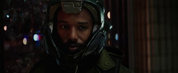 Movie still from “Kin” (2018), directed by Josh Baker – A person wearing a helmet; Close Up shot, Over the shoulder angle