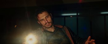 Movie still from “Kin” (2018), directed by Josh Baker – A person wearing a jacket; Close Up shot, Low angle