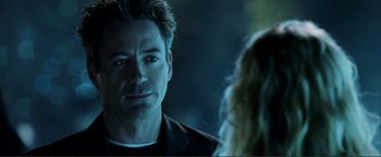 Movie still from “Kiss Kiss Bang Bang” (2005), directed by Shane Black – A person looking at another person; Close Up shot, Over the shoulder angle