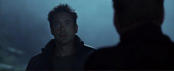 Movie still from “Kiss Kiss Bang Bang” (2005), directed by Shane Black – A person looking at a mirror; Close Up shot, Over the shoulder angle